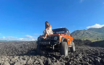 Group rafting on a turbulent river with jungle surroundings and splash